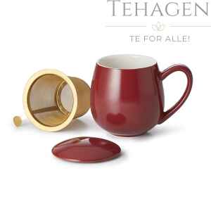 Porselens tekopp i rød bordeaux farge med filter i gylden farge og lokk